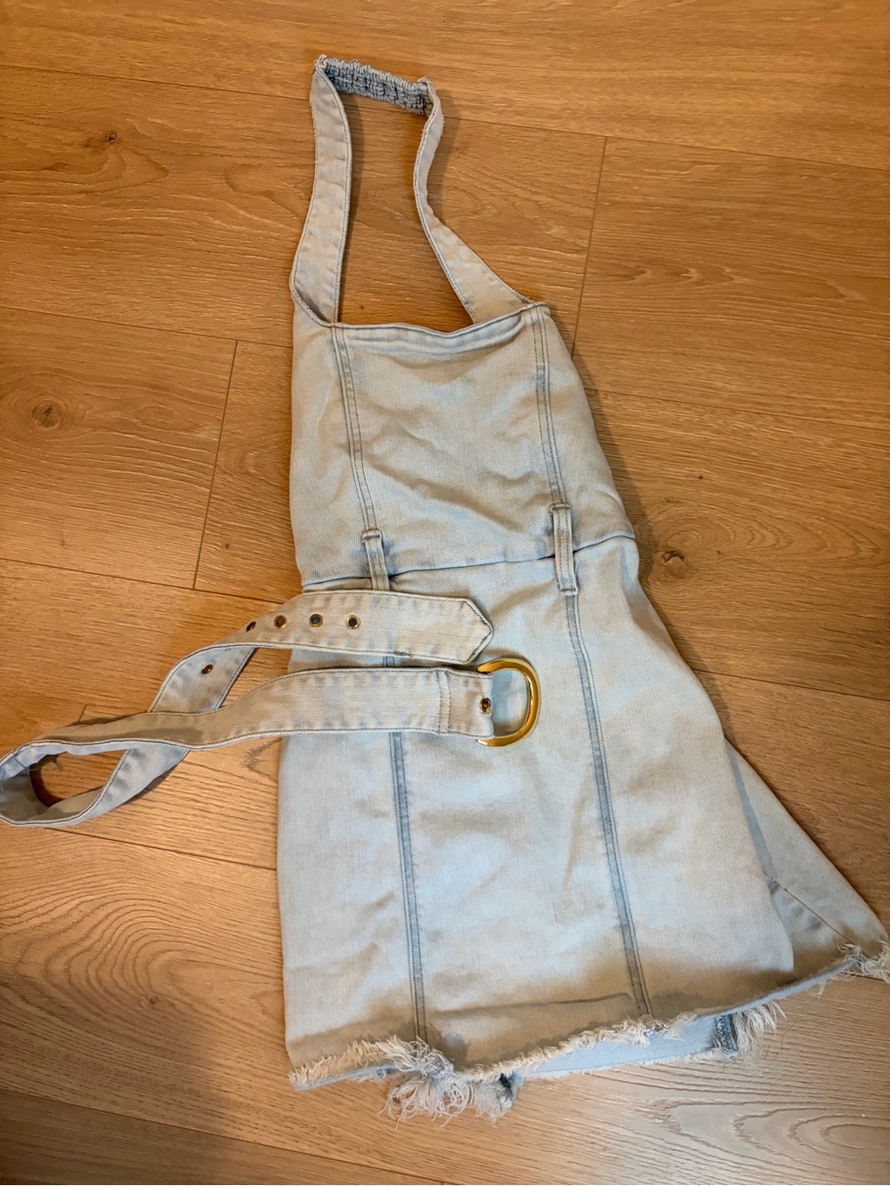 Show Me Your MuMu Light Wash Denim Mini Dress with Gold Buckle